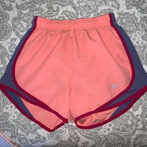 Peach nike running shorts